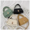 New Feminine Bag With New Texture Leather Simple Fashion Spring Lock Shoulder Bag With Woven Armpit Bag For Women