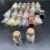 Import small size crystal quartz chips tiny bottles gemstone stone bottle with reki healing crystal chips inside crystal craft from China