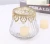 Import Unique Design Tea Light Holder Creative Glass Candlestick Cup with Silver Metal Clad Band Votive Candle Holders For Wholesale from China
