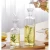 Import Wholesale 4oz 9oz 26oz Handmade Lead-Free Square Oil And Vinegar Glass Dispenser Bottle With Spout from China