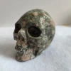 wholesale high quality natural amphibole rock deep color  crystal skulls for home decoration