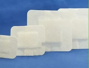 Disposable non-woven wound dressing self-adhesive