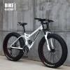 2021 Guang zhou china manufactures 4.0 tire snow bike  spoked wheel carbon steel double suspension snow mountain bicycle