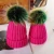 Import Big raccoon fur ball knitted wool hat women and kids knit beanie cap winter pom poms hats from China