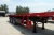 Import China Factory best price 3 Axles 40 ft Flatbed Container Semi Trailer For Transporting Container from China
