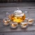 Import China kongfu tea set clear glass tea pot with cups warmer from China