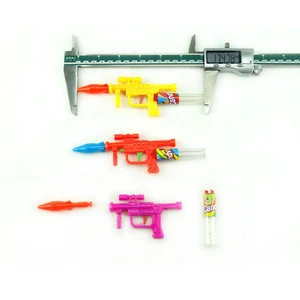 Hot selling China tray packing kids missile elastic gun plastic candy toy with candy beads