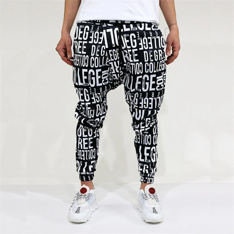 Men New Streetwear Letter printed Elastic waist Drawstring casual pants male hip hop Slim Jogging Little feet Casual trousers