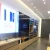Import New design silver wall stainless steel TV display showcase for huawei store experience from China