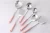 Import Stainless Steel Kitchen Cooking Utensil Tool With Ceramic Grip Slotted Tuner Spoon Ladle Pasta Server With Metal Stand Rack from China