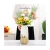 Import The latest hotel interior decoration design vase head white ceramic mini vase from China