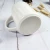 Import White Body Chrysanthemum Bottem 450ml Coffee Ceramic Mug Ceramic Coffee Mug With Logo from China