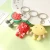 Import Wholesale cute PVC Keychain custom soft pvc keychains cartoon fruit family doll car key chain gift from China