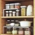Import Yushijia adjustable metal kitchen countertop storage shelves spice rack from China