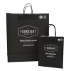 White kraft paper bag with black twisted paper handle