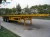 Import 2 Axle 3 Axles 20ft 40ft Container Transport Flat Bed Flat Deck Semi Truck Trailer Steel from China