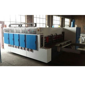 4colors fully printing slotting die cutting stacker machine , China corrugated box printing slotter machine
