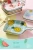 Import 8.86*6.3*1.38 inches Ceramic Bakeware with Handle Underglaze Fruit Omelette Pattern Rectangular Cute Cartoon Modern Rice Plate from China