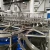 Import Automatic carbonated soda water plant filling line aerated water machine for soft drink beverage filling machine from China