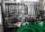 Import Glass Bottle Beverage Juice Alcohol Filling Machine Production Line Equipment from China