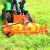 Grass cutting machine and farm tractor lawn mower