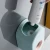Import Household Automatic Toothpaste Squeezing Holder Bathroom Punch Free Wall-mounted Toothpaste Dispenser from China