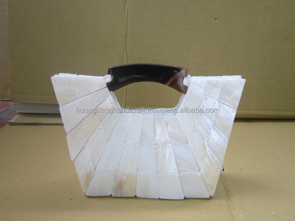 Lady handbag made of mother of pearl and suede for fashion in Vietnam, Hanoi