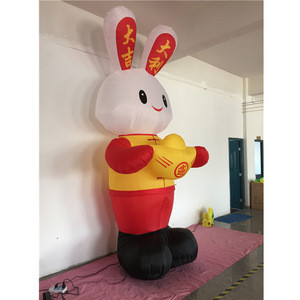 New year decoration wearing Tang suit rabbit holding gold ingot and lucky words words giant balloon
