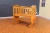 Import Nursery furniture sets wooden baby rocking crib manufacturers/baby cot from China