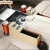 Import SUV front seat car gap storage box with USB charging and cup holder leather front seat car organizer from China