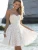 Import 2020 Trending Breathable Backless Floral Mini Sleeveless Hollow Out Wedding Formal Bridesmaid White Dresses from China