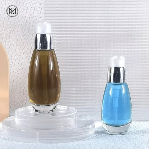 30ml 50ml Glass Cosmetic Skin Care Lotion Essence Cream Bottle With Luxury Silver Pump And Transparent Cap