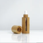 Bamboo covered glass lotion bottles bamboo essential oil bottle