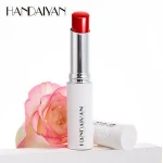 Best selling trendy women lip balm natural rose essence moisturizing nourishing lip plumper lip balm