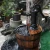Import Charred Wood 3-Tier Pump Fountain from China