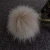 Import faux fur pom pom keychain animal fur ball key chain faux raccoon fur from China