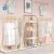 Import Gold metal clothing rack clothing shelf for clothing store display rack wholesale from China