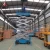 Import Hot sale 12m hydraulic movable scissor aerial work lift platform from China
