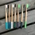 Import hot sell eco-friendly bamboo toothbrushes with round handles from China