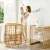 Import Multi-functional wood baby crib kids beds children table and chair mobile convertible wooden round baby bed from China