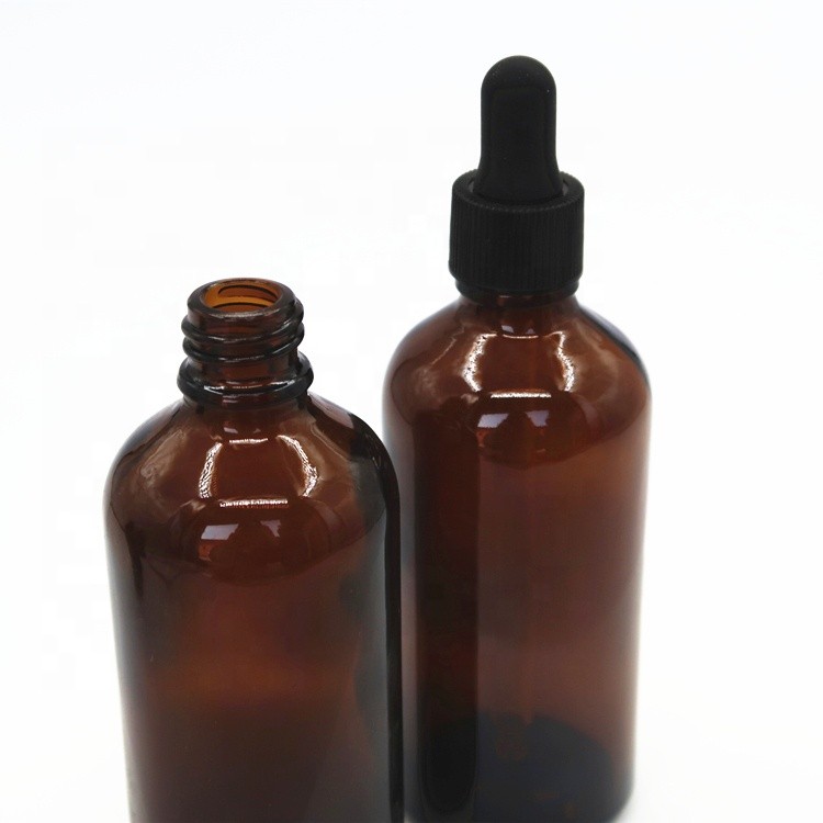 Wholesale essential oil glass bottle cosmetic packaging and printing bottles in store
