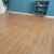 Import Wholesale natural wood color pvc plastic flooring rolls vinyl  floors from China