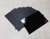 Flame retardant black plastic polycarbonate films and sheets