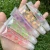 Import 2 in 1 Clear Lip Gloss Daul Color Lip Gloss Keychain from China
