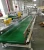 Import belt conveyor weighing system and bag flatten conveyor from China