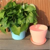 cheap green color self watering round garden outdoor planter flower pot for sale