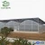 Import Good quality multi-span arch type PE film greenhouse with hydroponic system for agriculture from China