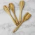 Import Handmade Natural Solid Wood Slotted Spoon Curved Spatula Cooking Olive Kitchen Utensils from China