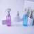 Import 100 ml 20/410 china pet cylinder plastic colorful flat shoulder shampoo lotion skincare hair oil spray bottle from China