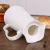 Import Porcelain embossed teapot ceramic big water jug 1.4L kettle for restaurant from China